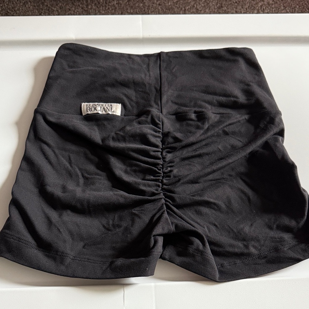 Black Women's biker shorts. Ruched butt. Size small. New. Never worn.